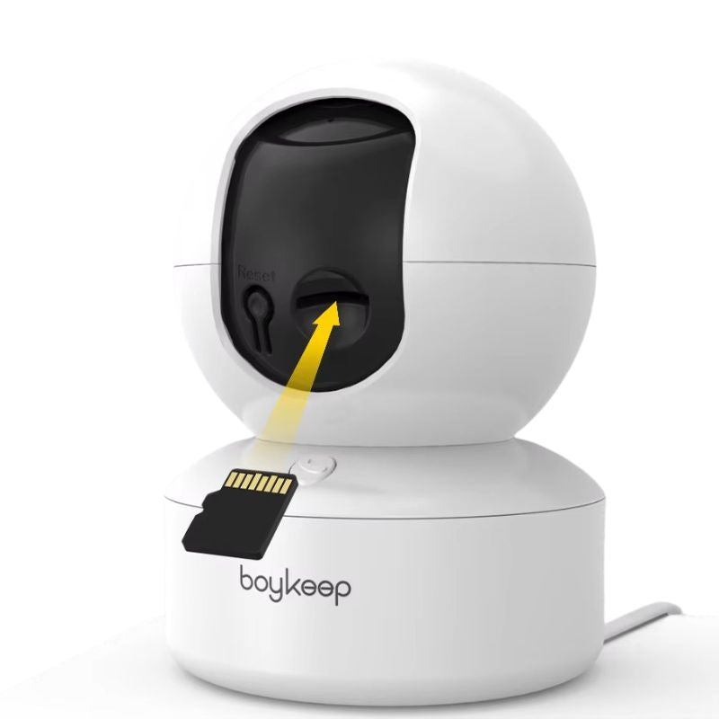 White security camera with a yellow arrow pointing to an SD card slot on a white background, featuring the brand 'boykeep'.
