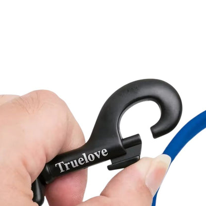 Black carabiner held by a hand with a white background