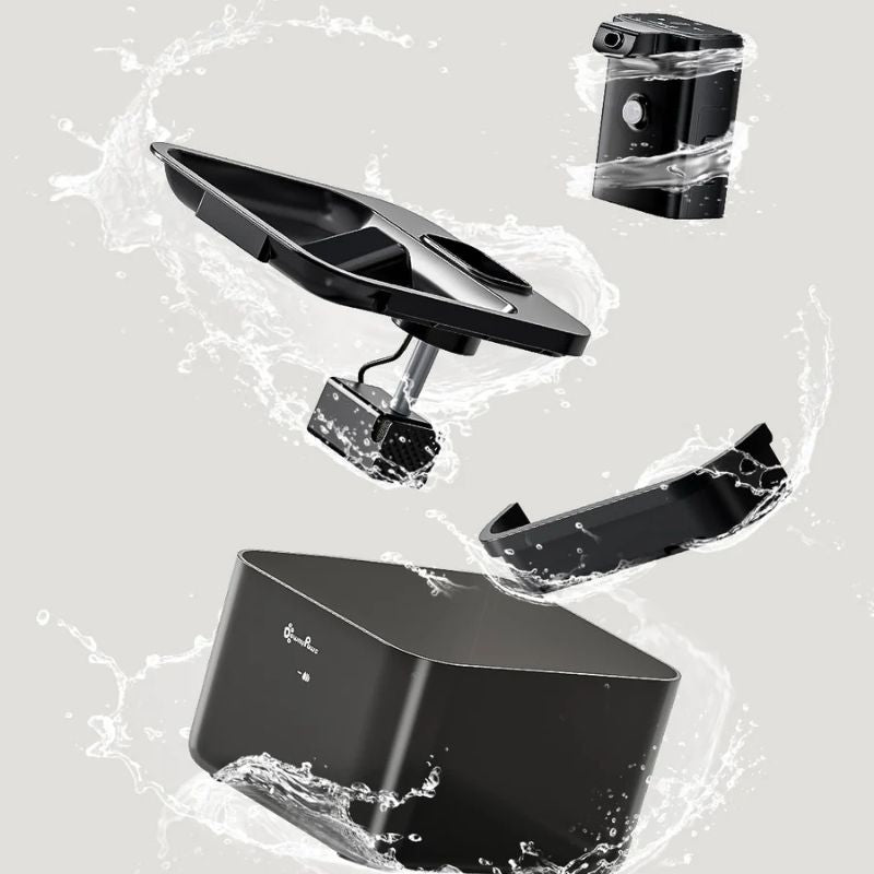 Black electronic device with water droplet effects on a gray background